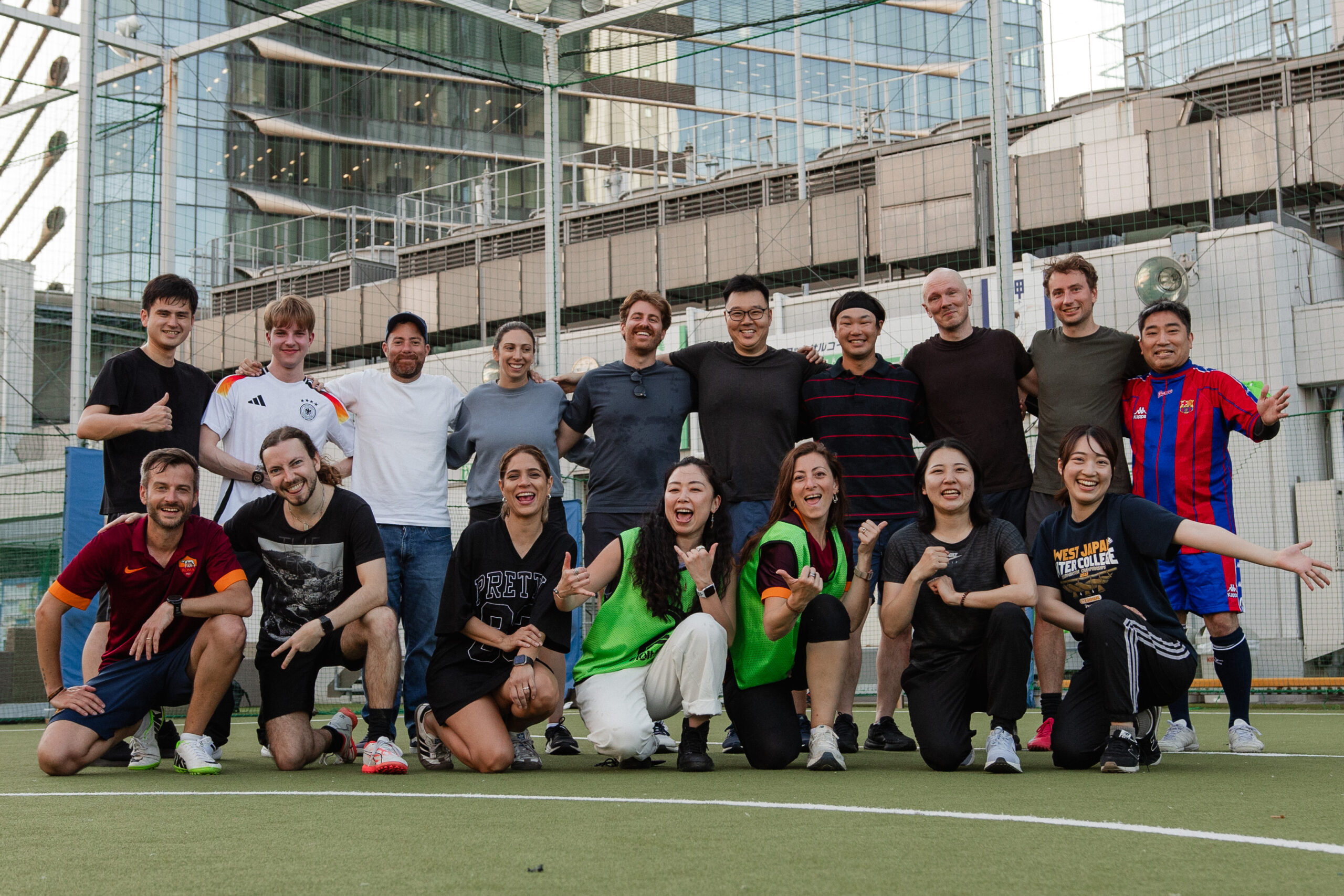 International FUTRFEST participants gathered for a futsal meetup, posing together as a group